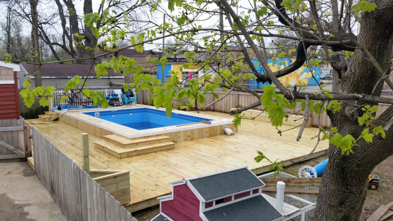 Above Ground Pool Deck with built in amenities such as storage benches, and flower boxes. Above Ground Pool Deck with built in amenities such as storage benches, and flower boxes.